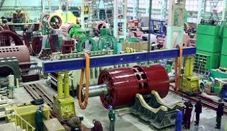 modern-industrial-factory-assembling-a-huge-industrial-equipment_4p7ic3-ox__s0000